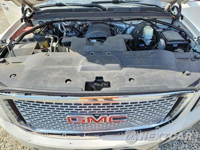 Zdjęcie 12 z 12 samochodu: 2015 GMC YUKON DENALI VIN:1GKS1CKJ9FR297744 - miniatura
