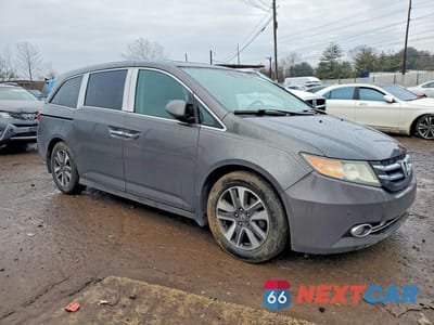 Czwarte zdjęcie samochodu z boku: 2015 HONDA ODYSSEY TOURING VIN:5FNRL5H9XFB064877 - miniatura