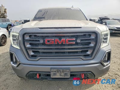 Piąte zdjęcie samochodu w środku: 2021 GMC SIERRA K1500 AT4 VIN:1GTU9EET5MZ381630 - miniatura