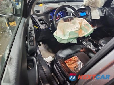 Zdjęcie 8 z 12 samochodu: 2013 HYUNDAI TUCSON GLS VIN:KM8JU3AC6DU547593 - miniatura