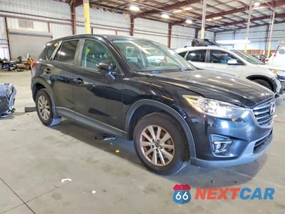 Czwarte zdjęcie samochodu z boku: 2016 MAZDA CX-5 TOURING VIN:JM3KE2CY6G0911779 - miniatura