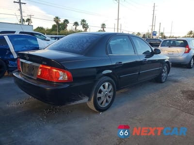 Trzecie zdjęcie samochodu z tyłu: 2005 KIA OPTIMA LX V6 VIN:KNAGD128955393130 - miniatura