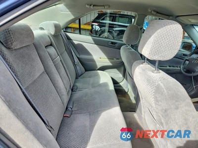 Zdjęcie 10 z 11 samochodu: 2004 TOYOTA CAMRY LE VIN:4T1BE32K64U789856 - miniatura