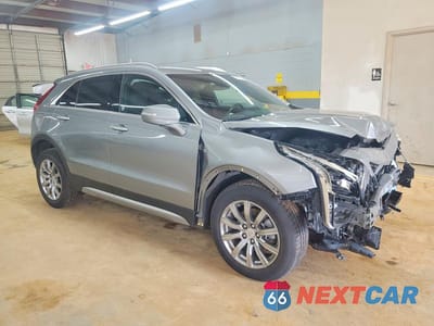 Czwarte zdjęcie samochodu z boku: 2023 CADILLAC XT4 PREMIUM LUXURY VIN:1GYFZDR43PF174921 - miniatura