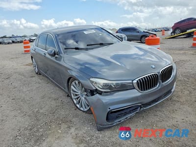Czwarte zdjęcie samochodu z boku: 2017 BMW 740 I VIN:WBA7E2C5XHG740075 - miniatura