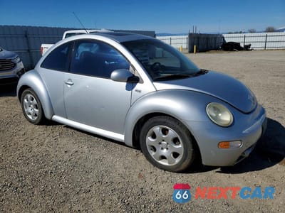 Czwarte zdjęcie samochodu z boku: 2003 VOLKSWAGEN NEW BEETLE GLS TDI VIN:3VWCP21C23M403876 - miniatura