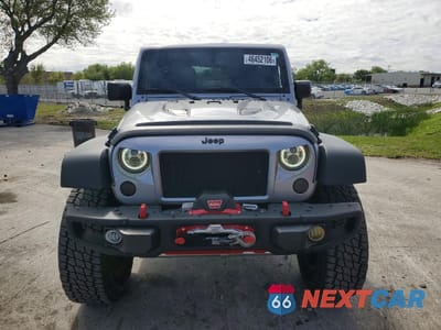 Piąte zdjęcie samochodu w środku: 2016 JEEP WRANGLER UNLIMITED RUBICON VIN:1C4HJWFG2GL122648 - miniatura