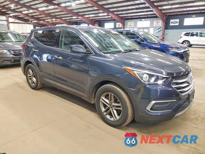 Czwarte zdjęcie samochodu z boku: 2018 HYUNDAI SANTA FE SPORT 2.4L VIN:5NMZTDLB6JH084880 - miniatura