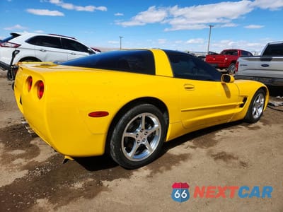 Trzecie zdjęcie samochodu z tyłu: 2004 CHEVROLET CORVETTE VIN:1G1YY22G545101795 - miniatura
