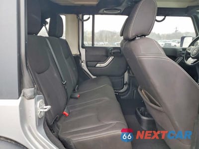 Zdjęcie 10 z 11 samochodu: 2013 JEEP WRANGLER UNLIMITED SAHARA VIN:1C4BJWEG9DL602625 - miniatura