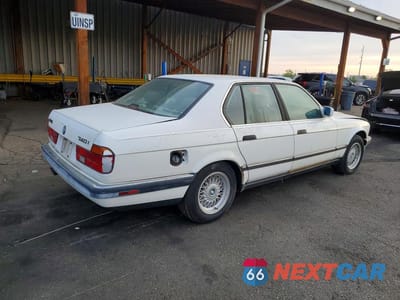 Trzecie zdjęcie samochodu z tyłu: 1993 BMW 740 I AUTOMATIC VIN:WBAGD4322PDE60612 - miniatura
