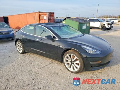 Czwarte zdjęcie samochodu z boku: 2019 TESLA MODEL 3 VIN:5YJ3E1EB0KF453392 - miniatura