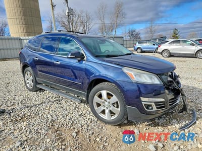Czwarte zdjęcie samochodu z boku: 2015 CHEVROLET TRAVERSE LTZ VIN:1GNKRJKD0FJ217322 - miniatura