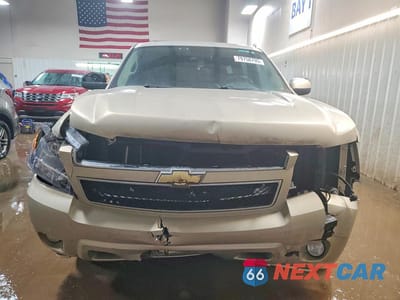 Piąte zdjęcie samochodu w środku: 2010 CHEVROLET SUBURBAN K1500 LT VIN:1GNUKJE34AR187977 - miniatura