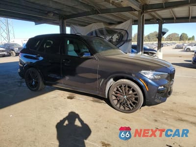 Czwarte zdjęcie samochodu z boku: 2021 BMW X5 SDRIVE 40I VIN:5UXCR4C07M9H53632 - miniatura
