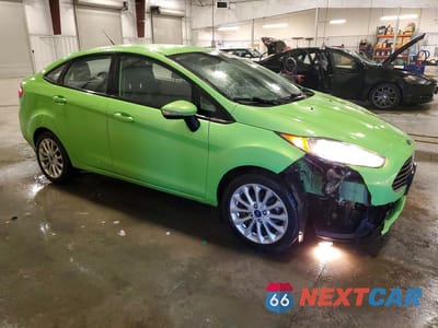Czwarte zdjęcie samochodu z boku: 2014 FORD FIESTA SE VIN:3FADP4BJ0EM153630 - miniatura