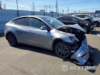 Czwarte zdjęcie samochodu z boku: 2024 TESLA MODEL Y VIN:7SAYGDED7RF211585 - miniatura