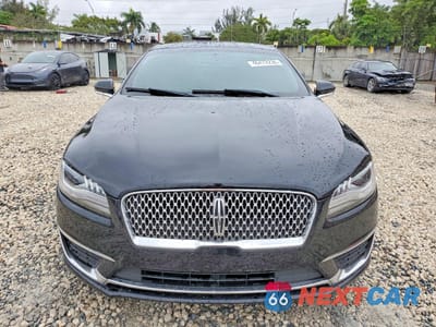 Piąte zdjęcie samochodu w środku: 2017 LINCOLN MKZ RESERVE VIN:3LN6L5F99HR605145 - miniatura