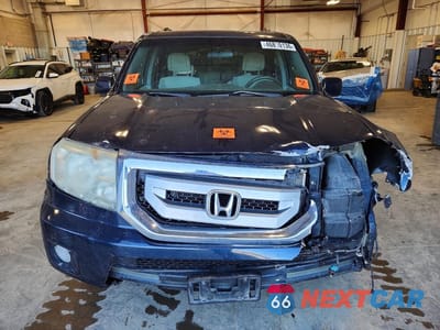 Piąte zdjęcie samochodu w środku: 2011 HONDA PILOT EX VIN:5FNYF4H46BB008429 - miniatura