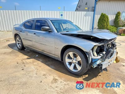 Czwarte zdjęcie samochodu z boku: 2006 DODGE CHARGER R VIN:2B3KA53HX6H241560 - miniatura