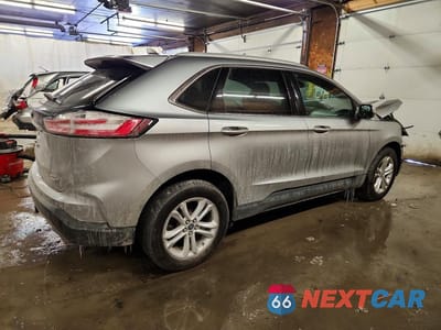 Trzecie zdjęcie samochodu z tyłu: 2020 FORD EDGE SEL VIN:2FMPK4J93LBA18505 - miniatura