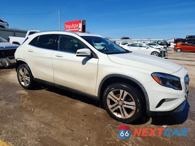 Czwarte zdjęcie samochodu z boku: 2015 MERCEDES-BENZ GLA 250 4MATIC VIN:WDCTG4GB3FJ082357 - miniatura