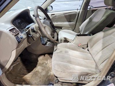 Zdjęcie 7 z 12 samochodu: 2001 TOYOTA COROLLA LE VIN:2T1BR12E61C413545 - miniatura