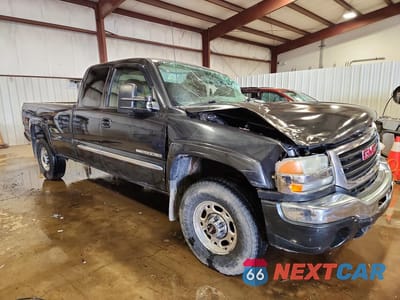 Czwarte zdjęcie samochodu z boku: 2004 GMC SIERRA K2500 HEAVY DUTY VIN:1GTHK29U74E271113 - miniatura