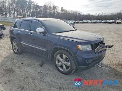 Czwarte zdjęcie samochodu z boku: 2012 JEEP GRAND CHEROKEE OVERLAND VIN:1C4RJFCTXCC294359 - miniatura
