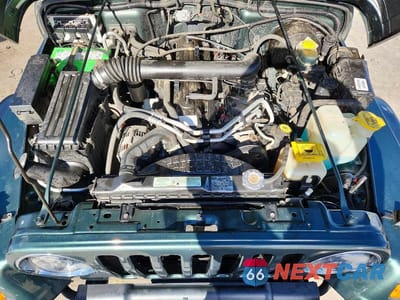 Zdjęcie 12 z 13 samochodu: 2002 JEEP WRANGLER / TJ SPORT VIN:1J4FA49S32P731769 - miniatura