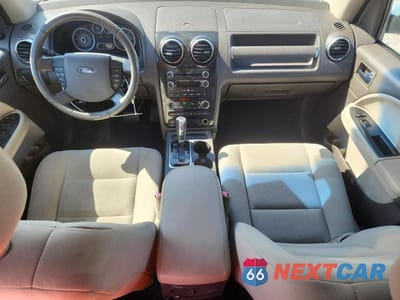 Zdjęcie 8 z 13 samochodu: 2008 FORD TAURUS SEL VIN:1FMDK02W88GA15230 - miniatura