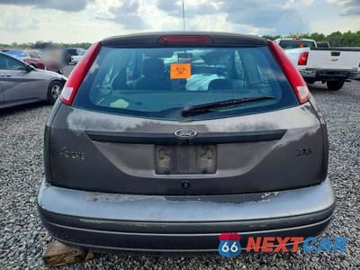 Zdjęcie 6 z 11 samochodu: 2002 FORD FOCUS ZX3 VIN:3FAFP31322R228672 - miniatura