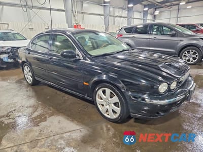 Czwarte zdjęcie samochodu z boku: 2005 JAGUAR X-TYPE 3.0 VIN:SAJWA51C65WE24191 - miniatura