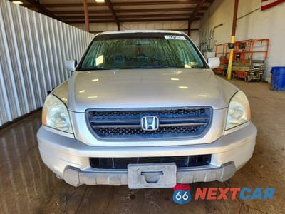 Piąte zdjęcie samochodu w środku: 2005 HONDA PILOT EXL VIN:2HKYF18535H523210 - miniatura
