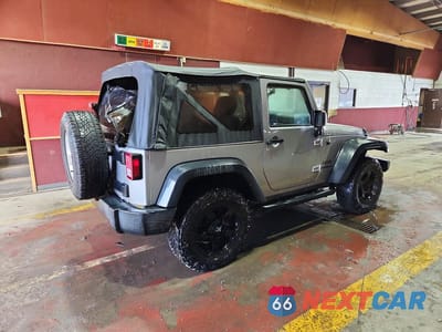 Trzecie zdjęcie samochodu z tyłu: 2016 JEEP WRANGLER SPORT VIN:1C4AJWAG1GL181831 - miniatura