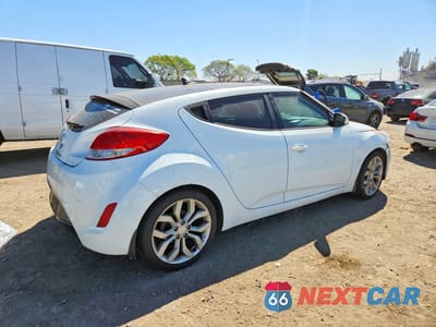 Trzecie zdjęcie samochodu z tyłu: 2013 HYUNDAI VELOSTER BASE VIN:KMHTC6AD0DU167395 - miniatura