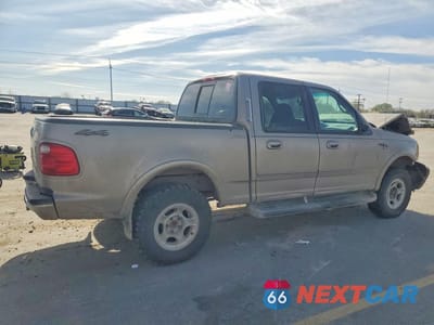 Trzecie zdjęcie samochodu z tyłu: 2001 FORD F150 SUPERCREW VIN:1FTRW08LX1KE47932 - miniatura