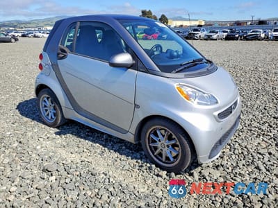 Czwarte zdjęcie samochodu z boku: 2016 SMART CARS FORTWO VIN:WMEEJ9AA7GK845359 - miniatura