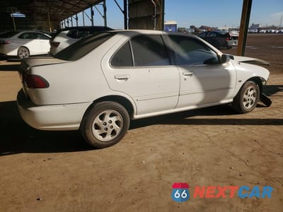 Trzecie zdjęcie samochodu z tyłu: 1999 NISSAN SENTRA XE VIN:1N4AB41D1XC719439 - miniatura