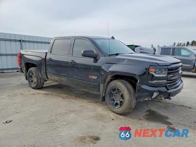Czwarte zdjęcie samochodu z boku: 2018 CHEVROLET SILVERADO K1500 LTZ VIN:3GCUKSECXJG359749 - miniatura
