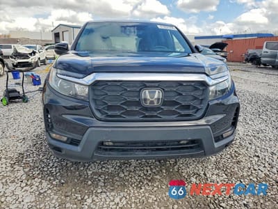 Piąte zdjęcie samochodu w środku: 2022 HONDA PASSPORT EXL VIN:5FNYF7H55NB003835 - miniatura