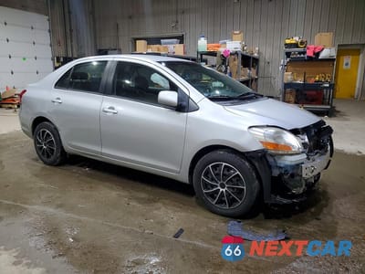 Czwarte zdjęcie samochodu z boku: 2010 TOYOTA YARIS BASE VIN:JTDBT4K31A1354006 - miniatura