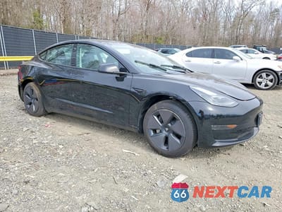 Czwarte zdjęcie samochodu z boku: 2023 TESLA MODEL 3 VIN:5YJ3E1EA4PF679157 - miniatura