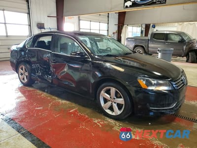 Czwarte zdjęcie samochodu z boku: 2012 VOLKSWAGEN PASSAT SE VIN:1VWBP7A32CC042515 - miniatura