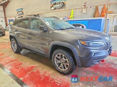 Czwarte zdjęcie samochodu z boku: 2022 JEEP CHEROKEE TRAILHAWK VIN:1C4PJMBXXND514953 - miniatura