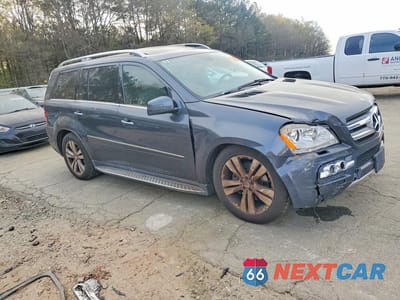 Czwarte zdjęcie samochodu z boku: 2011 MERCEDES-BENZ GL 450 4MATIC VIN:4JGBF7BEXBA666235 - miniatura