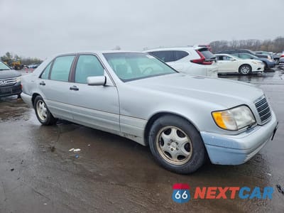 Czwarte zdjęcie samochodu z boku: 1997 MERCEDES-BENZ S 500 VIN:WDBGA51G4VA359467 - miniatura