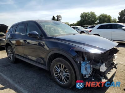 Czwarte zdjęcie samochodu z boku: 2017 MAZDA CX-5 TOURING VIN:JM3KFACL8H0214711 - miniatura