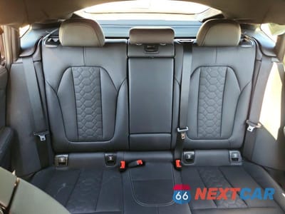 Zdjęcie 10 z 13 samochodu: 2023 BMW X4 M VIN:5YM23EC04P9P36350 - miniatura