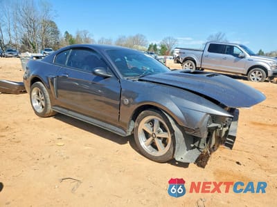 Czwarte zdjęcie samochodu z boku: 2004 FORD MUSTANG MACH I VIN:1FAFP42R74F168123 - miniatura